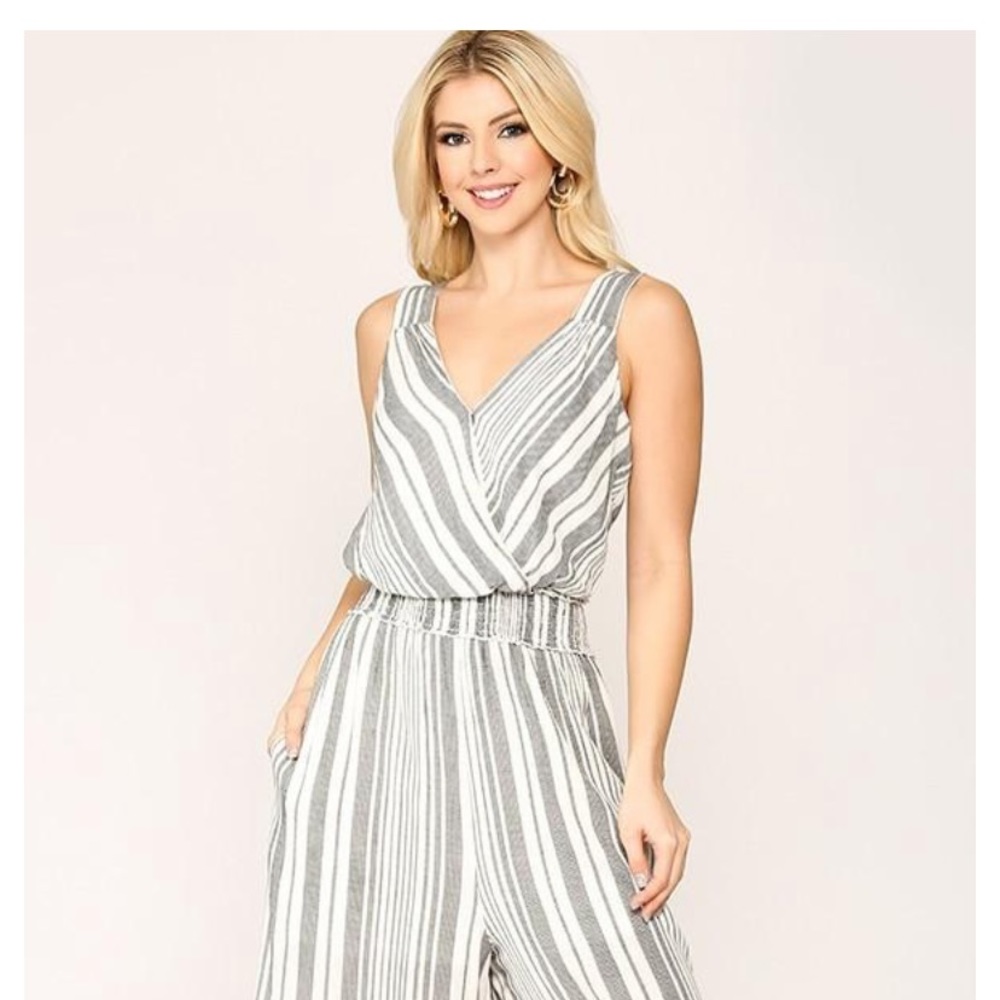 Brand new with tags. Size small, fits S & M